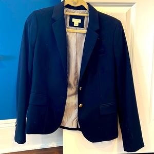 Navy blue blazer size 6 from J Crew with gold buttons. In great condition.